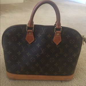 Louis Vuitton Alma Handbag